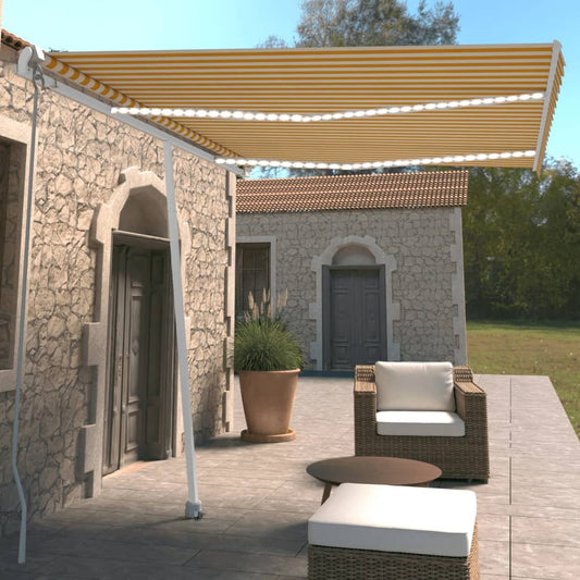 Manual retractable awning with LED 350x250 cm yellow and white